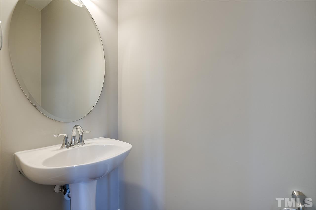 1004 Lakeview Road Durham, NC 27712 - Photo 11 of 25 a sink and a mirror