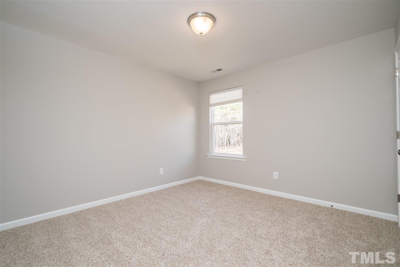 1004 Lakeview Road Durham, NC 27712 - Photo 17 of 25 an empty room with a window