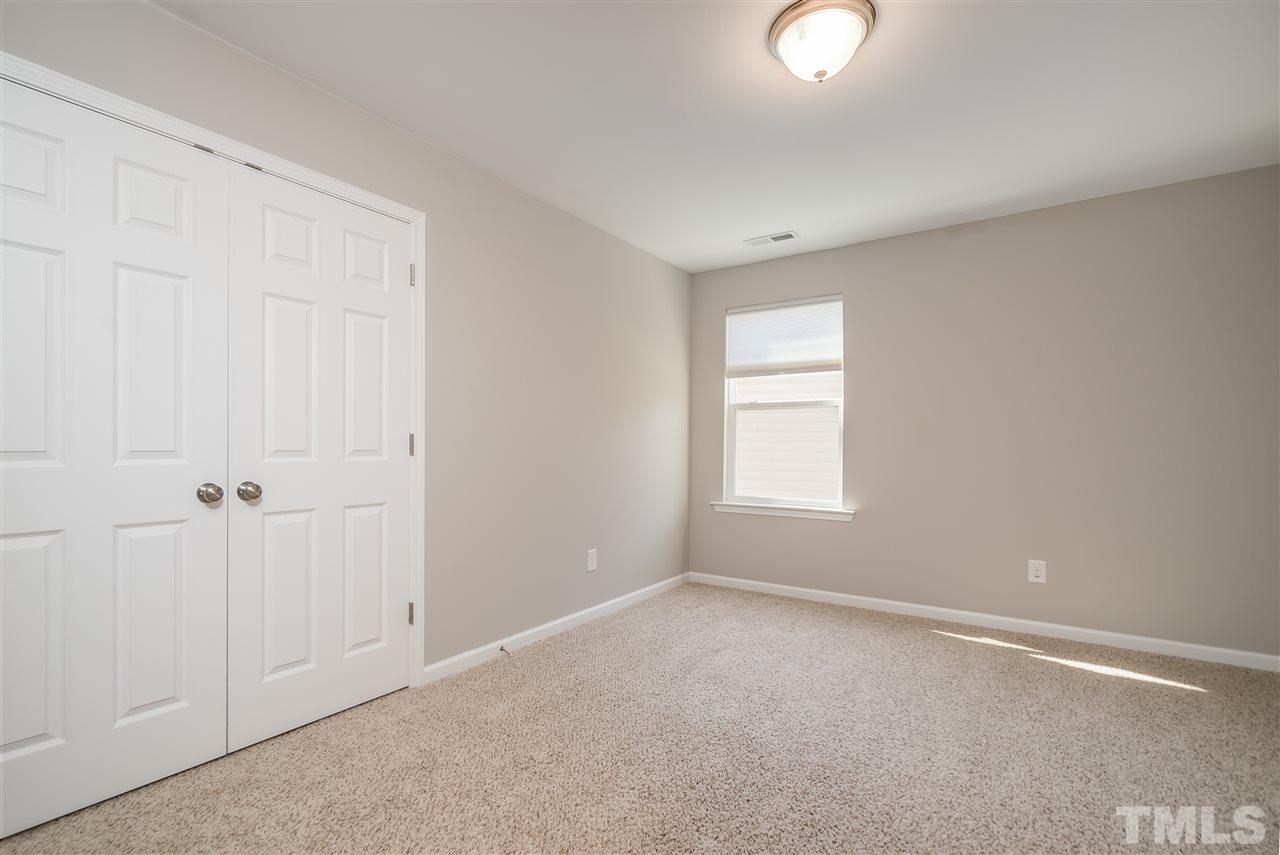 1004 Lakeview Road Durham, NC 27712 - Photo 19 of 25 a view of an empty room with a window
