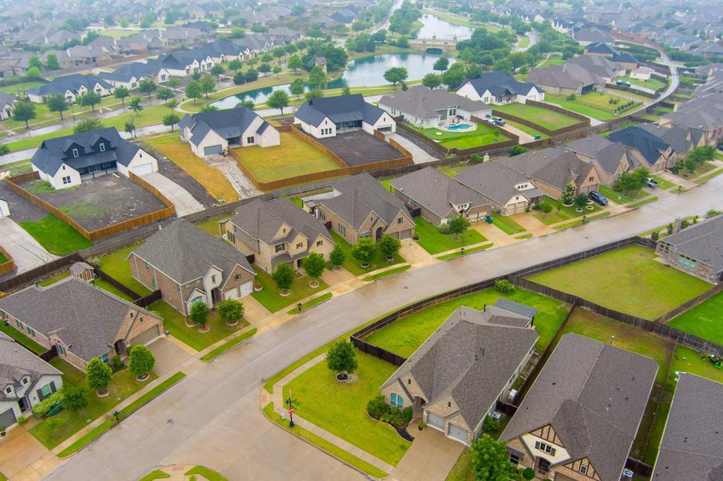 1501 Calcot Lane Forney, TX 75126 - Photo 32 of 34 Aerial view showcasing a residential development with multiple single-family homes