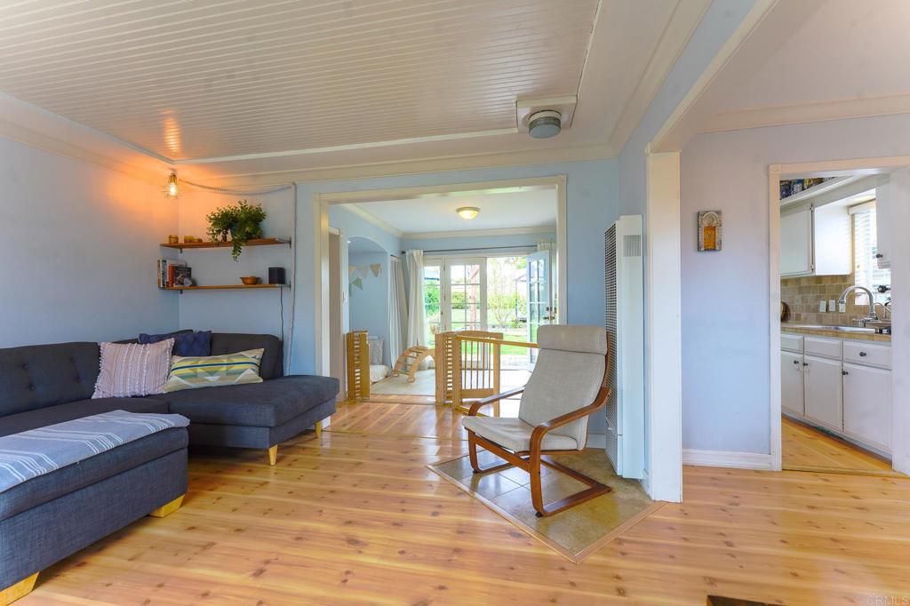 1043 Aloha Drive Encinitas, CA 92024 - Photo 12 of 27 a living room with furniture and a table