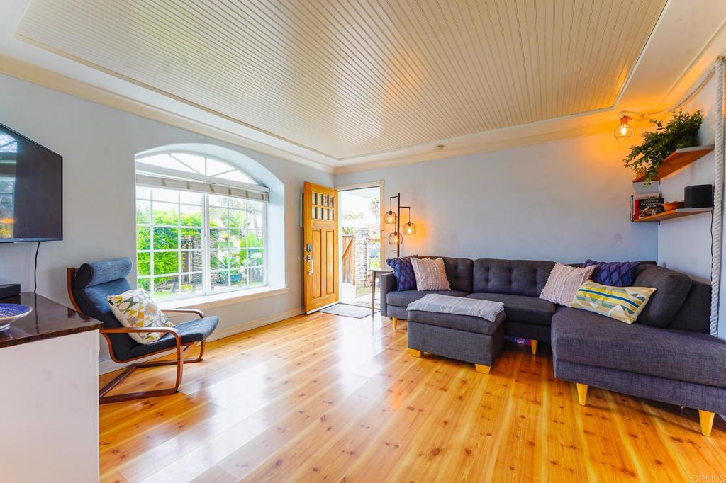 1043 Aloha Drive Encinitas, CA 92024 - Photo 13 of 27 a living room with furniture and a large window