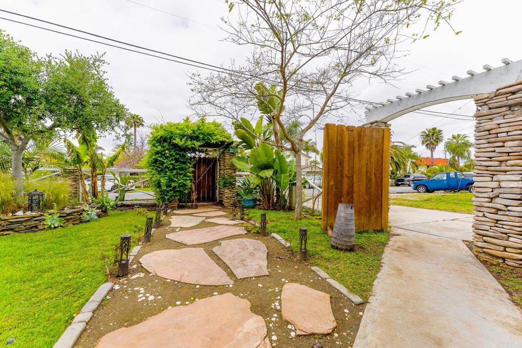 1043 Aloha Drive Encinitas, CA 92024 - Photo 7 of 27 a view of a back yard of the house