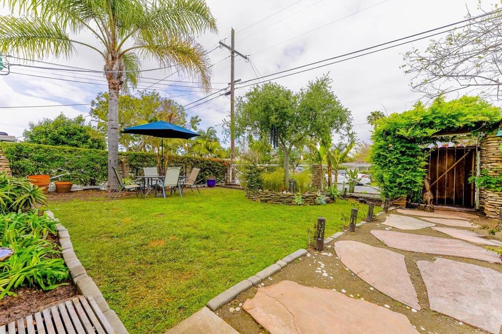 1043 Aloha Drive Encinitas, CA 92024 - Photo 8 of 27 a view of a chairs in a backyard