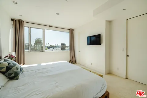 a view of a backyard with sitting area