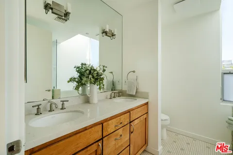 a view of a balcony with chairs