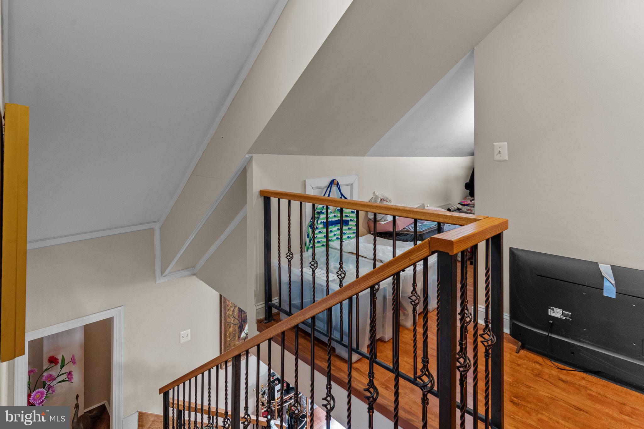 813 Piermont Street Philadelphia, PA 19116 - Photo 11 of 37 a view of staircase with railing and white walls