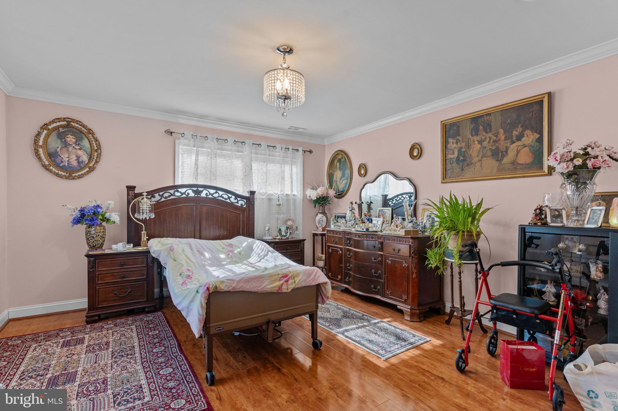 813 Piermont Street Philadelphia, PA 19116 - Photo 12 of 37 a bedroom with furniture and a window
