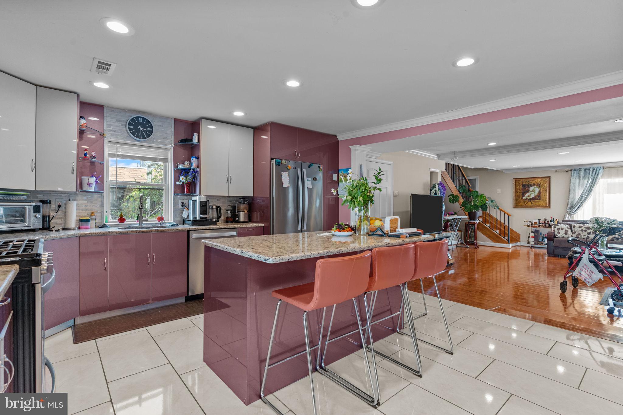 813 Piermont Street Philadelphia, PA 19116 - Photo 19 of 37 a large kitchen with lots of counter space and furniture