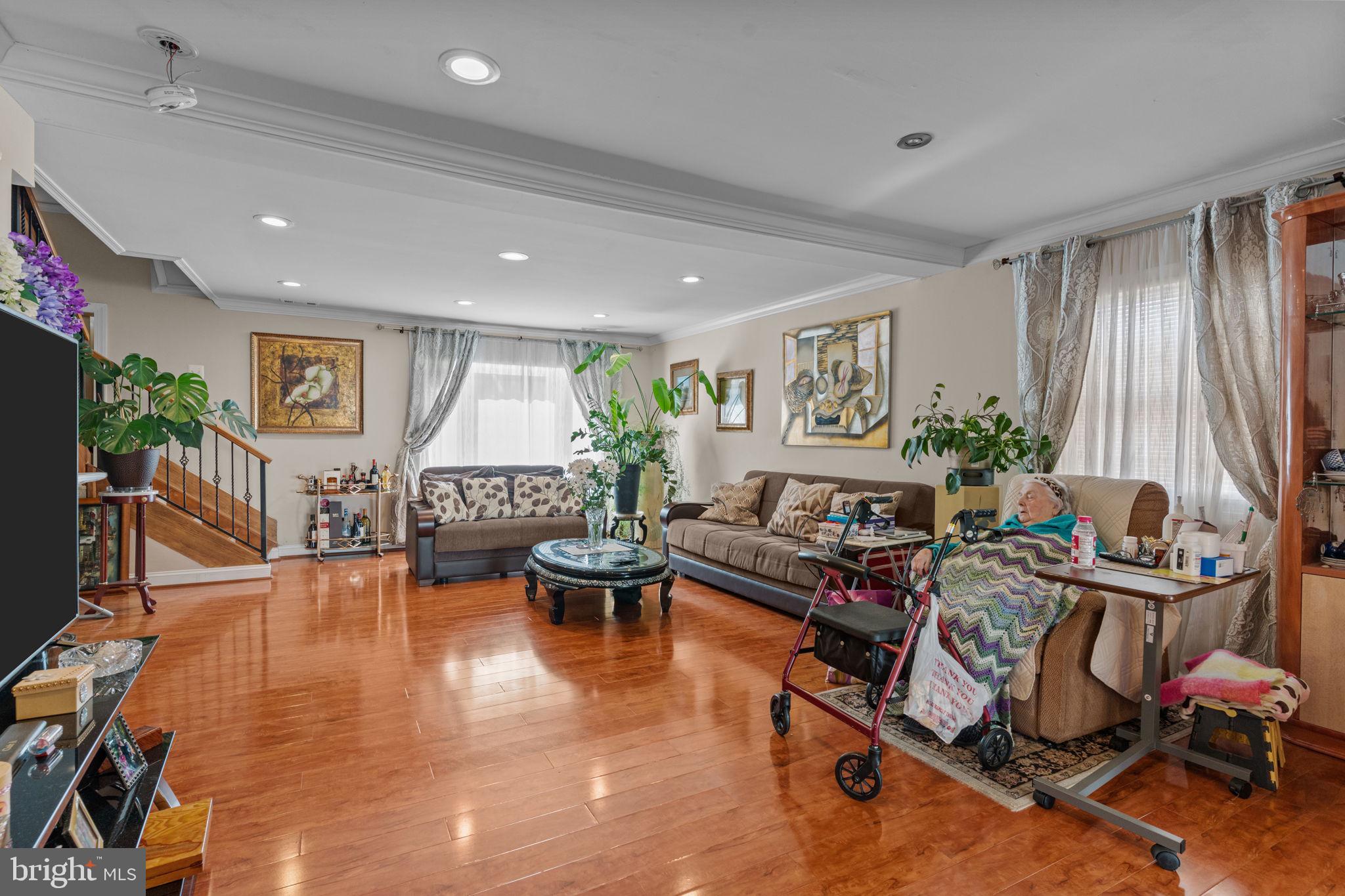 813 Piermont Street Philadelphia, PA 19116 - Photo 24 of 37 a living room with furniture a window and a table