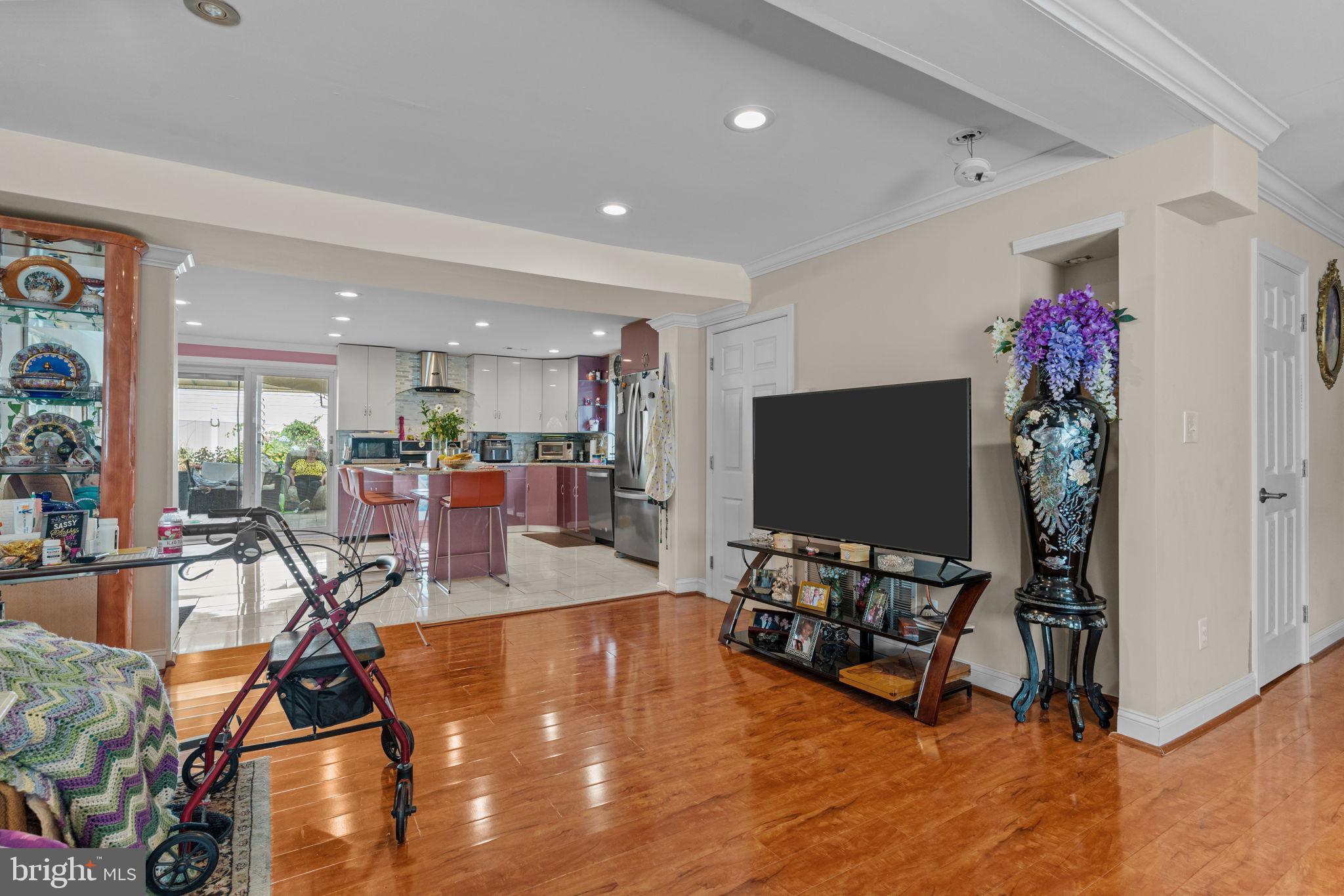 813 Piermont Street Philadelphia, PA 19116 - Photo 26 of 37 a living room with furniture and a flat screen tv