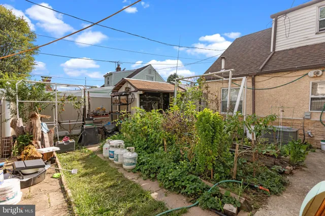 a view of a building with potted plants