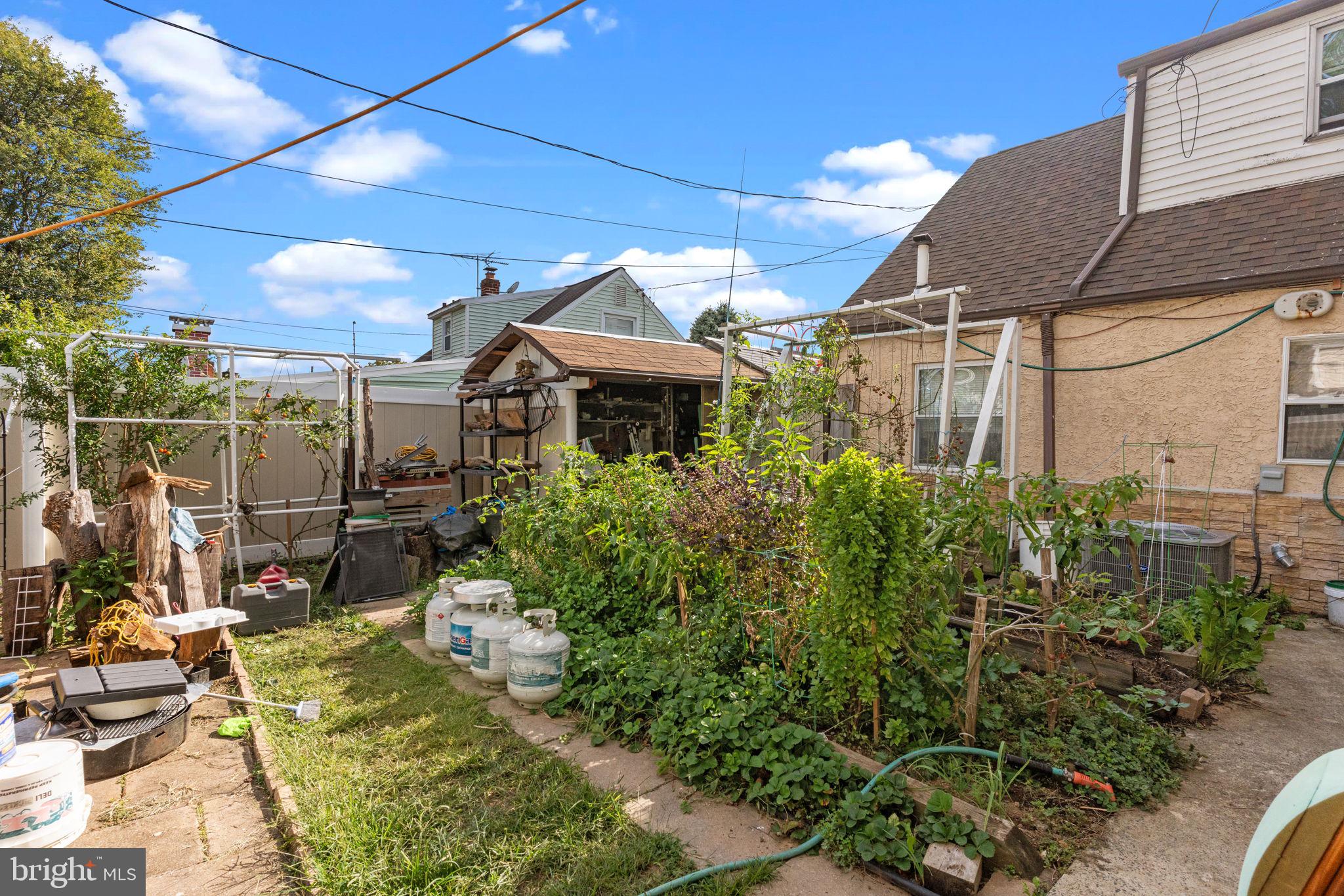 813 Piermont Street Philadelphia, PA 19116 - Photo 30 of 37 a view of a chair and tables in patio