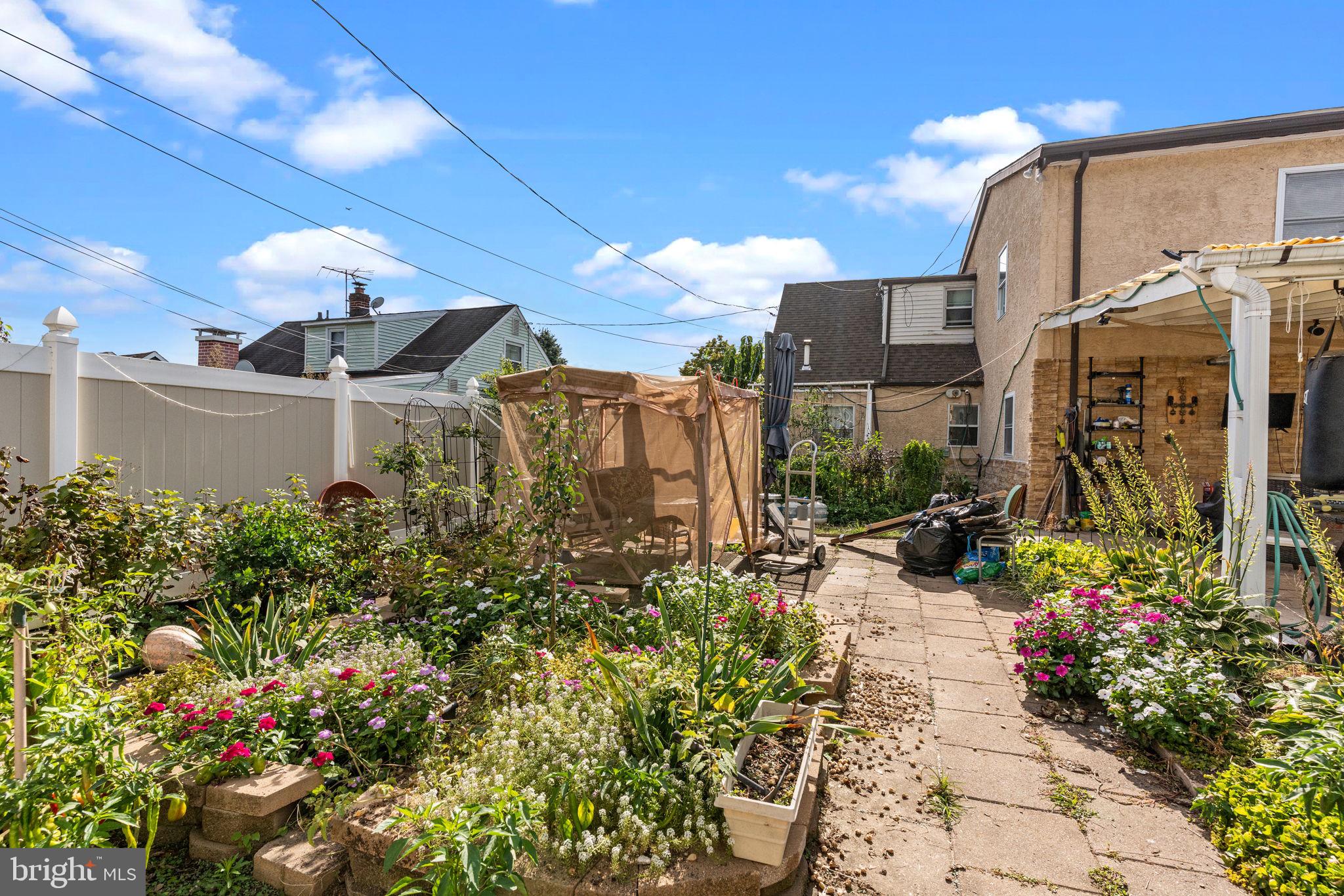 813 Piermont Street Philadelphia, PA 19116 - Photo 32 of 37 a view of a building with potted plants