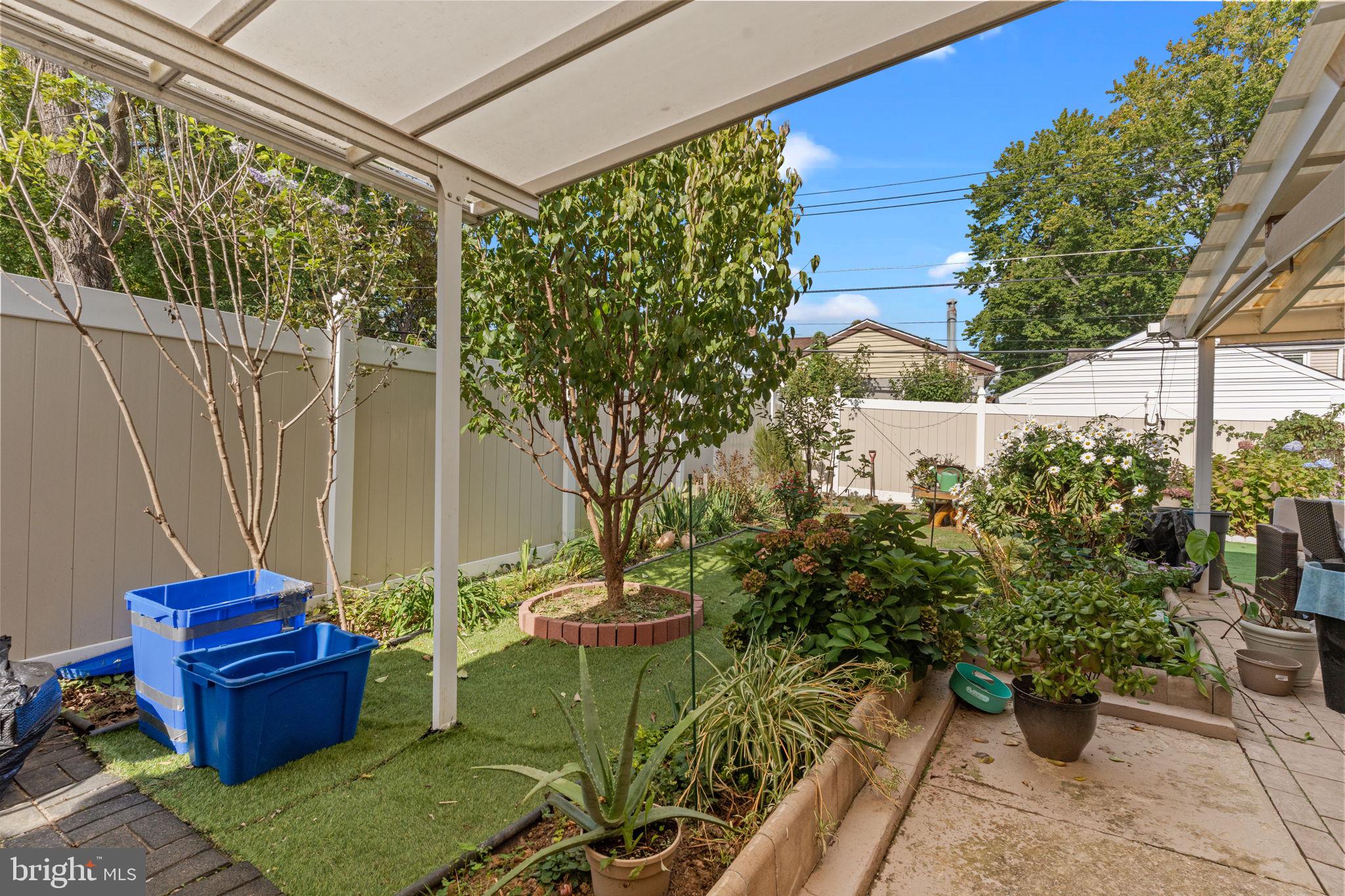 813 Piermont Street Philadelphia, PA 19116 - Photo 34 of 37 a view of a backyard with sitting area