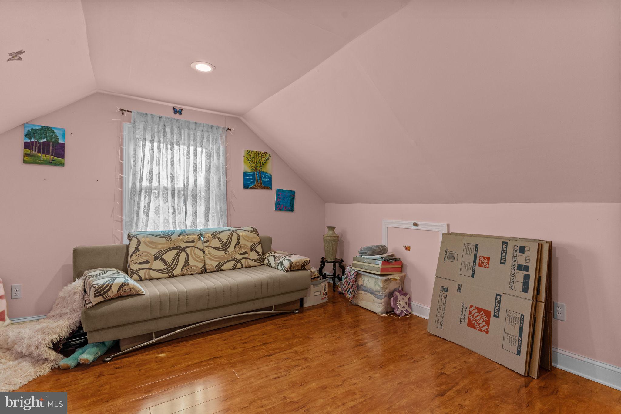813 Piermont Street Philadelphia, PA 19116 - Photo 4 of 37 a living room with furniture and a window