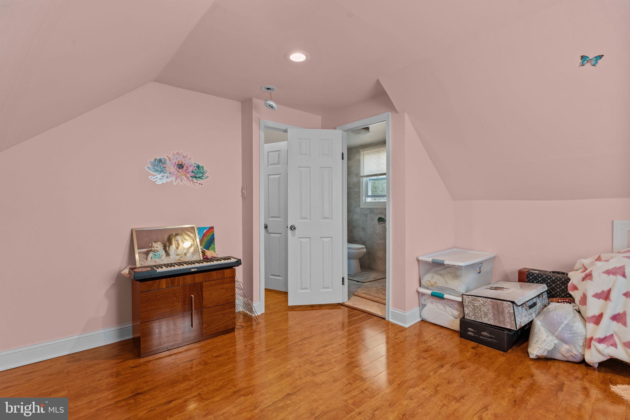 813 Piermont Street Philadelphia, PA 19116 - Photo 5 of 37 a living room with furniture and wooden floor