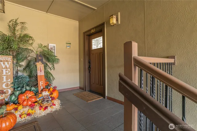 a view of a kitchen with furniture and a kitchen