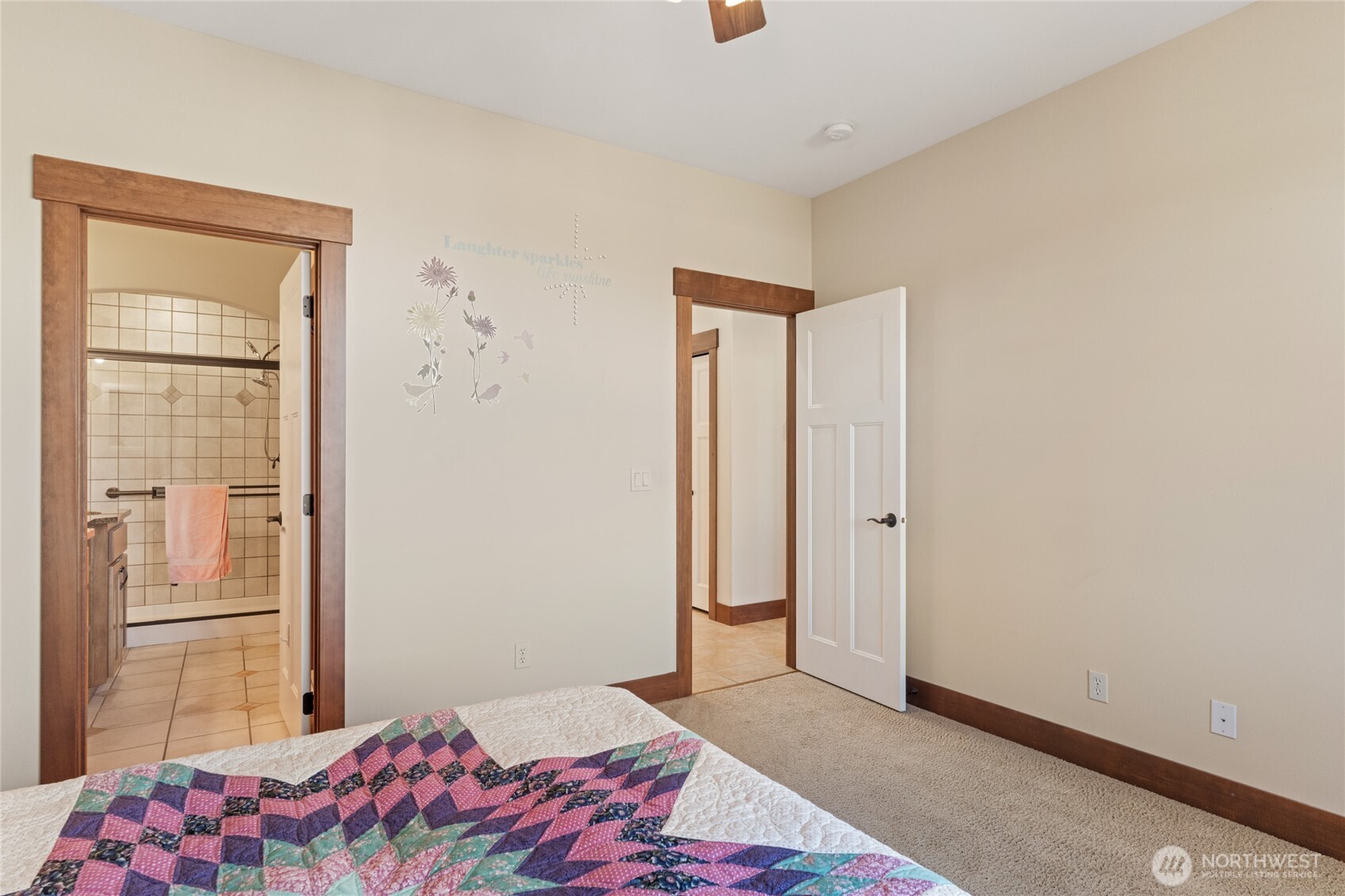 1051 North Baker Avenue, Unit B203 East Wenatchee, WA 98802 - Photo 26 of 33 a bedroom with a bed and a mirror