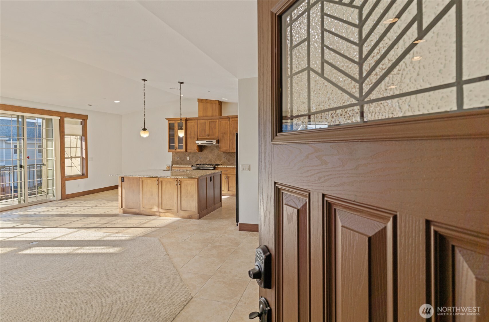 1051 North Baker Avenue, Unit B203 East Wenatchee, WA 98802 - Photo 3 of 33 a view of a kitchen with furniture and a kitchen