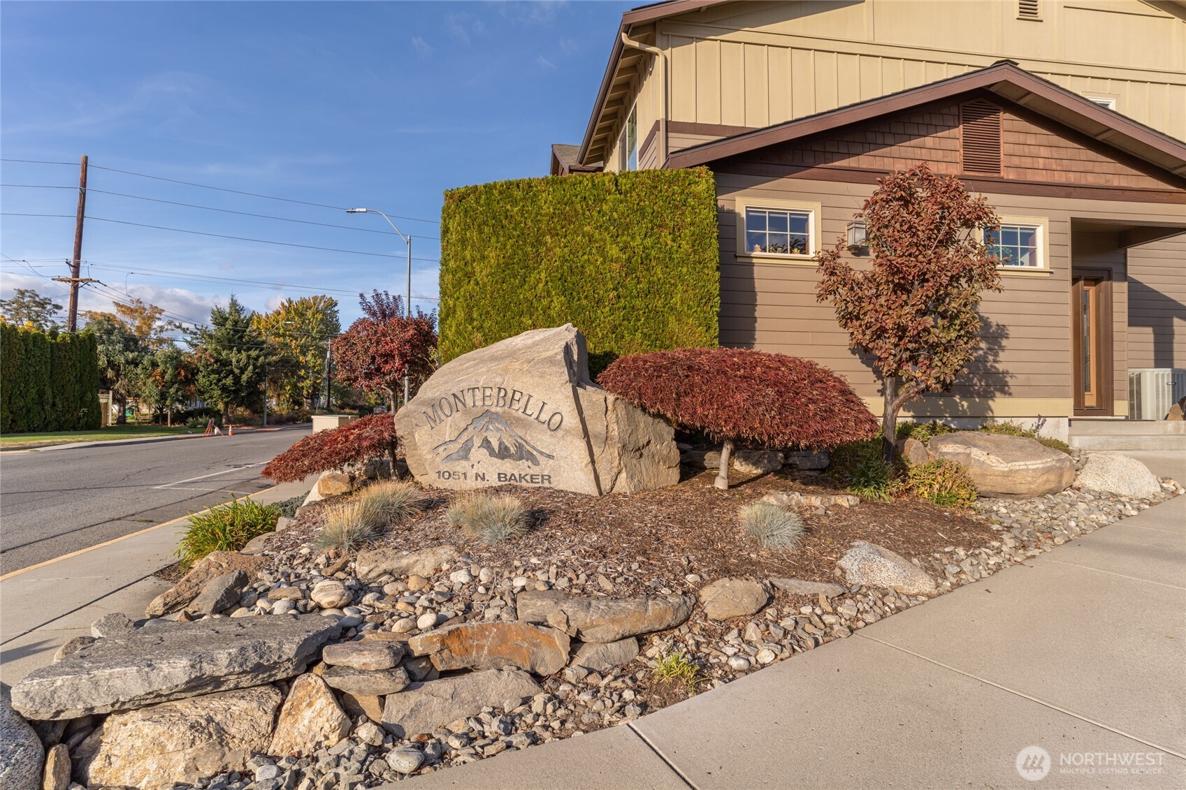 1051 North Baker Avenue, Unit B203 East Wenatchee, WA 98802 - Photo 33 of 33 a view of a house with a yard