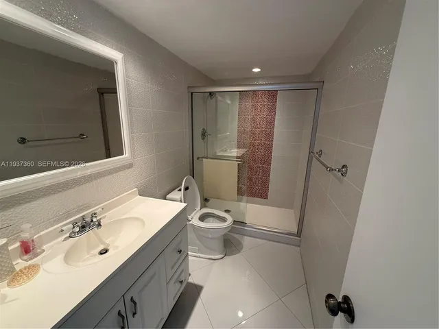 a view of a hallway with closet