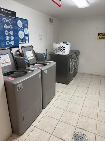 a view of kitchen with washer and dryer