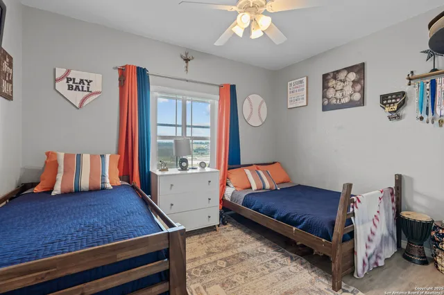 a bed room with a bed and a window