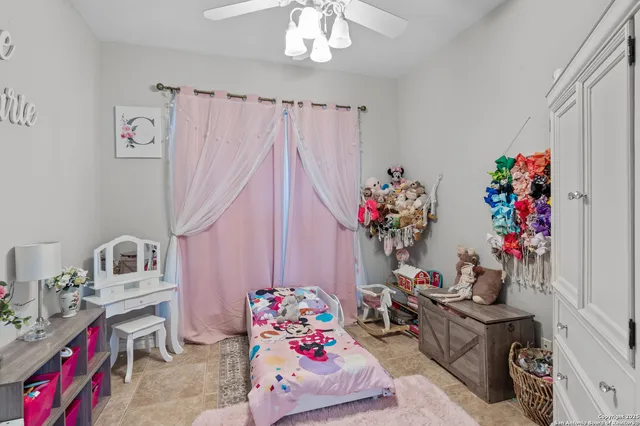 a room with toys and a chandelier