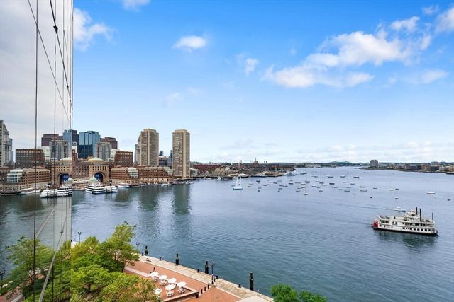 a view of a city with tall buildings