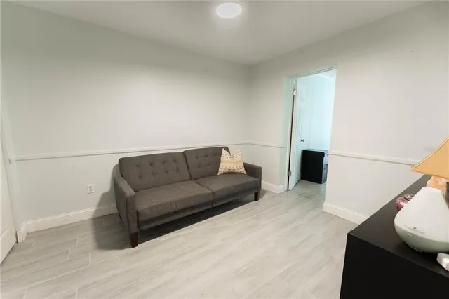 a living room with furniture and a couch