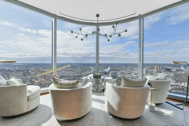 a view of a living room and a glass door
