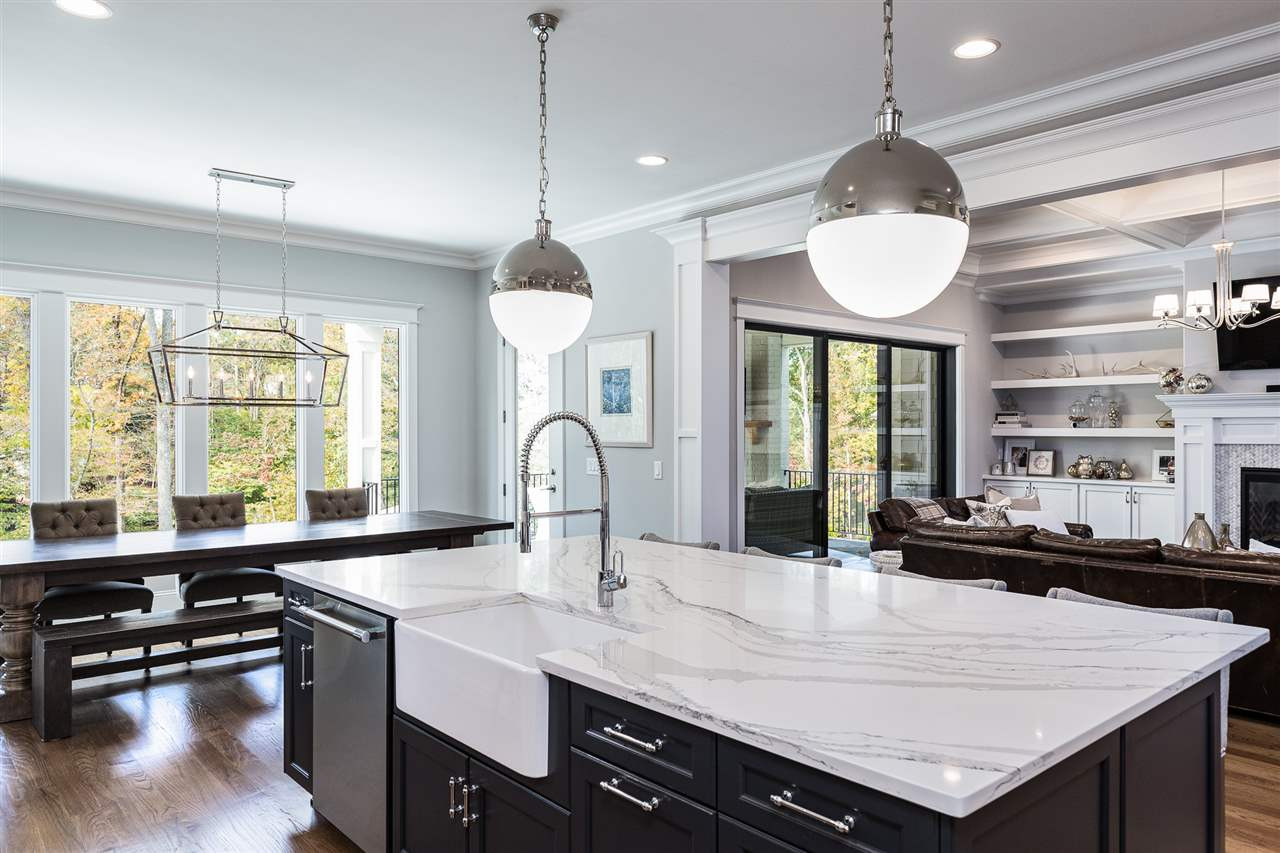 5417 Winding View Lane Raleigh, NC 27615 - Photo 5 of 30 Note the large breakfast room overlooking the backyard with stunning views of the pool and landscaping. Kitchen island with quartz counters
