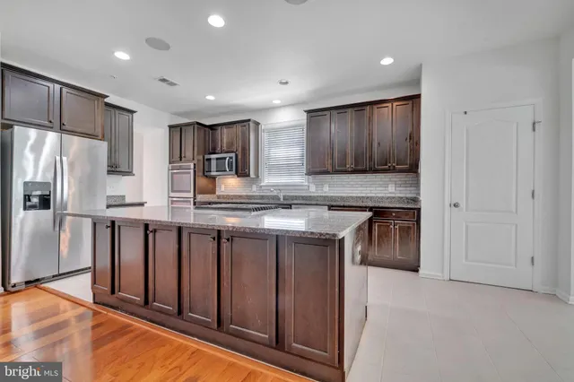 a view of a porch with wooden floor