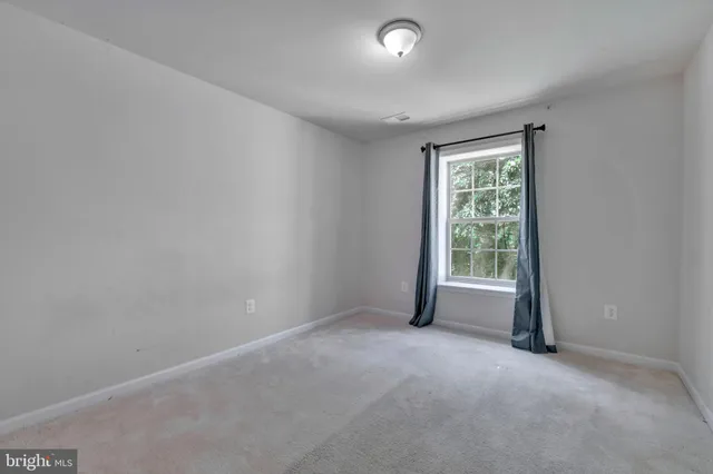 a kitchen with sink stainless steel appliances and cabinets