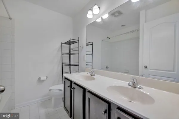 a view of balcony with wooden floor and fence