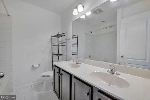a view of balcony with wooden floor and fence