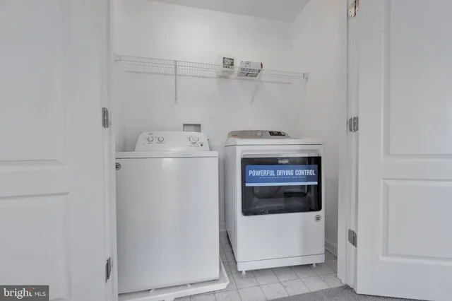 a view of balcony with wooden floor and fence