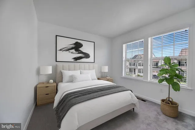 a kitchen with stainless steel appliances granite countertop a stove and a refrigerator