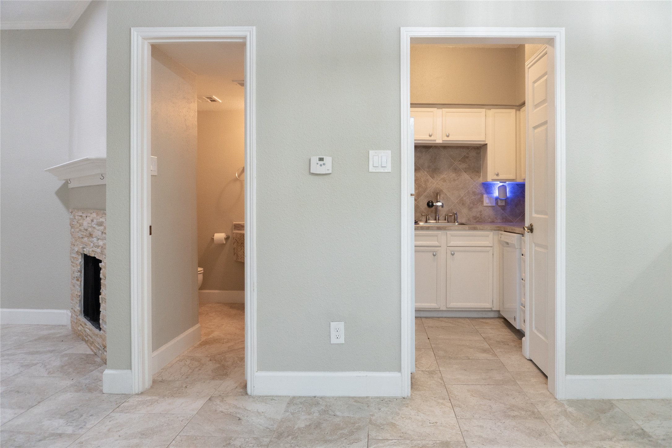 2100 Tanglewilde Street, Unit 455 Houston, TX 77063 - Photo 11 of 37 Just off the living spaces, you will find a powder bath and kitchen!