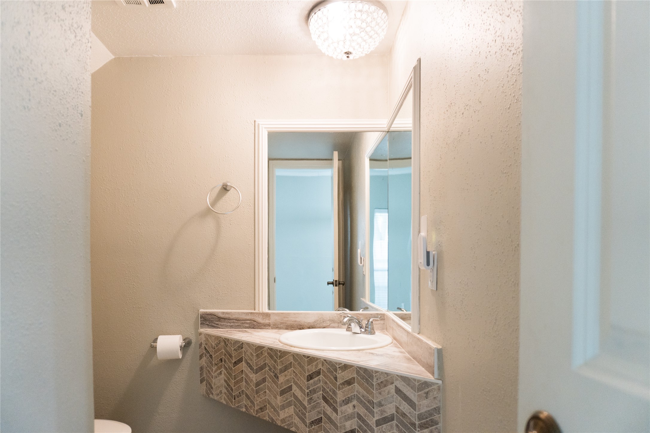 2100 Tanglewilde Street, Unit 455 Houston, TX 77063 - Photo 12 of 37 A downstairs powder bath is just the place for guests to freshen up during a visit!