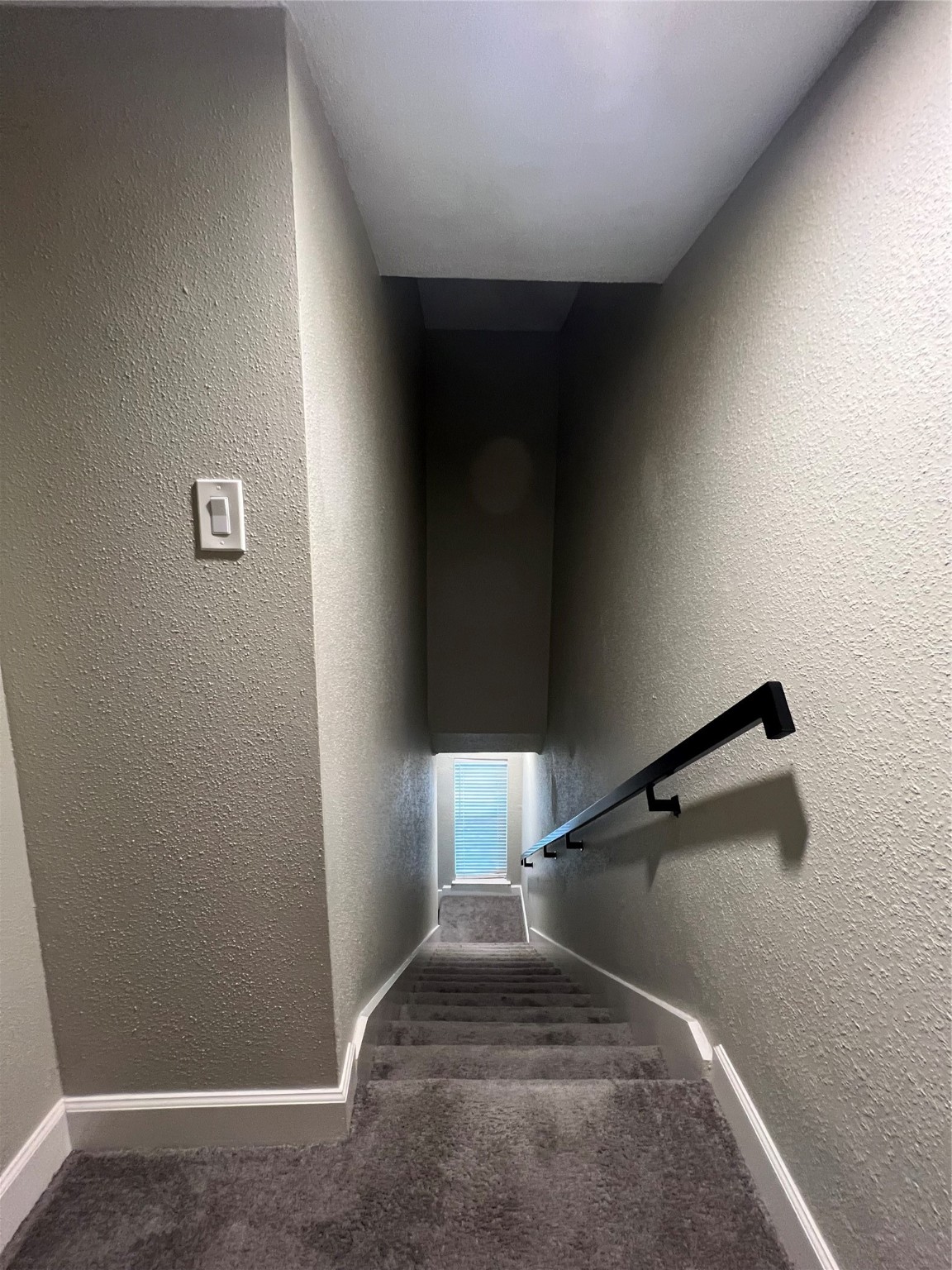 2100 Tanglewilde Street, Unit 455 Houston, TX 77063 - Photo 18 of 37 Natural light flows into the staircase from the downstairs window!