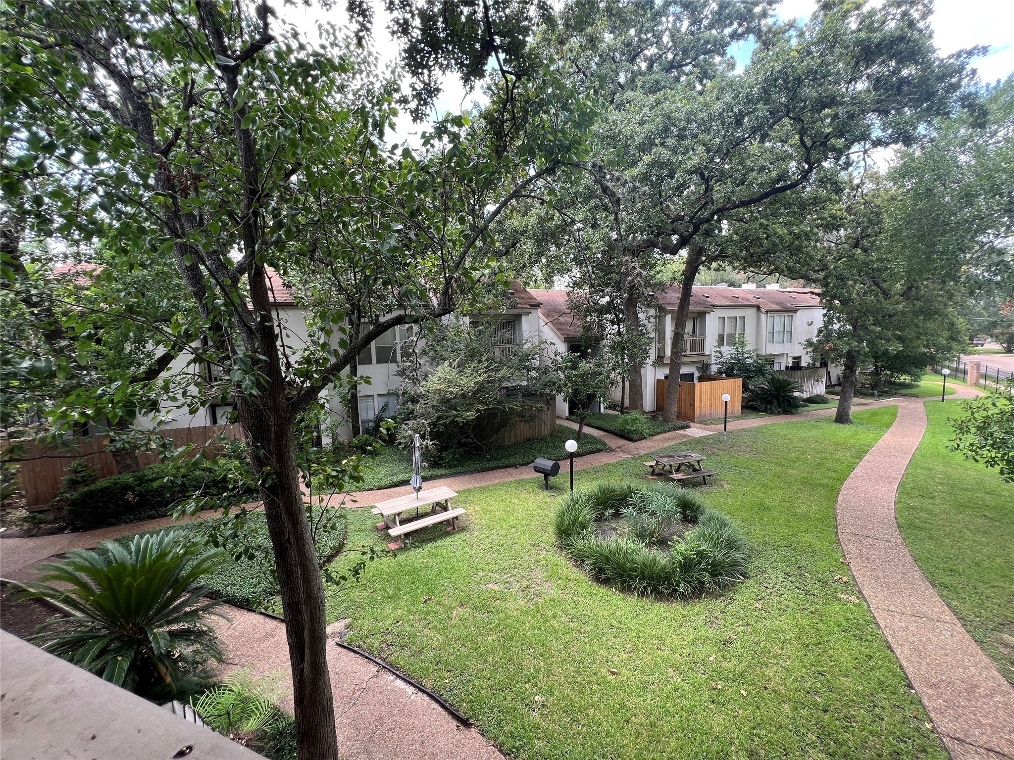 2100 Tanglewilde Street, Unit 455 Houston, TX 77063 - Photo 29 of 37 Lace up your sneakers and take the path that leads around the complex!