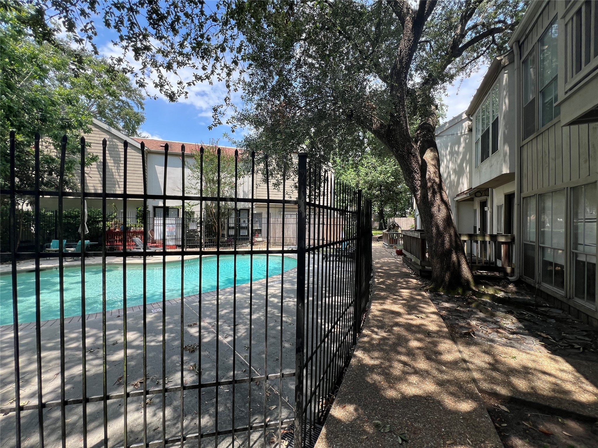 2100 Tanglewilde Street, Unit 455 Houston, TX 77063 - Photo 31 of 37 The pool area is gated as well for added safety and security!