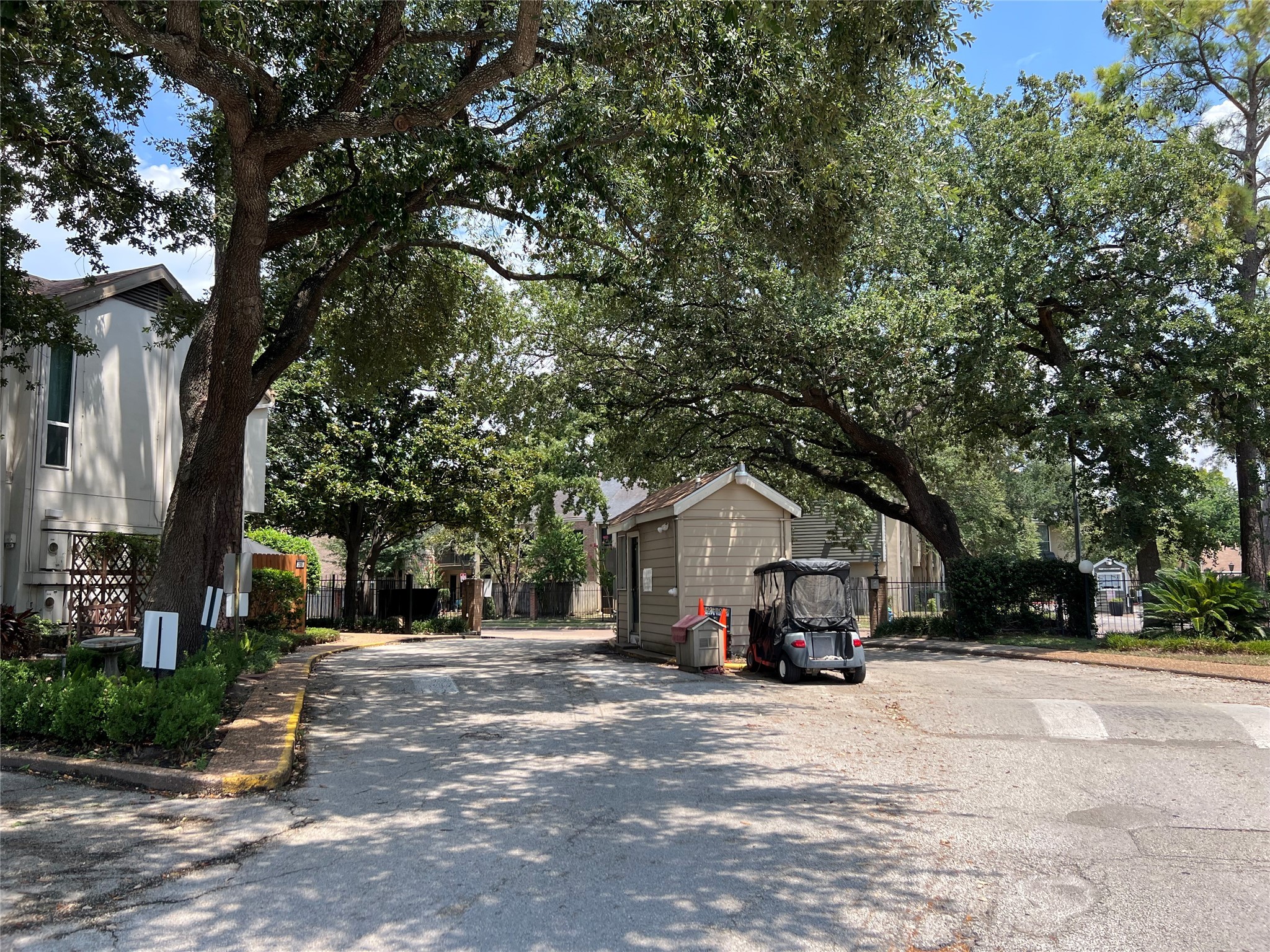 2100 Tanglewilde Street, Unit 455 Houston, TX 77063 - Photo 34 of 37 Manned-gated community, where lush landscapes, serene surroundings, and a true sense of privacy create an exceptional place to call home.