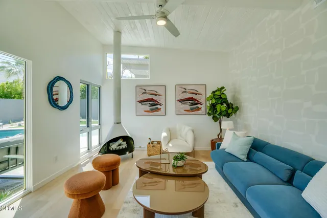 a kitchen with stainless steel appliances granite countertop a refrigerator and a stove