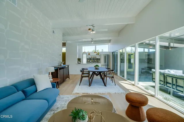 a kitchen with stainless steel appliances granite countertop a stove and a refrigerator