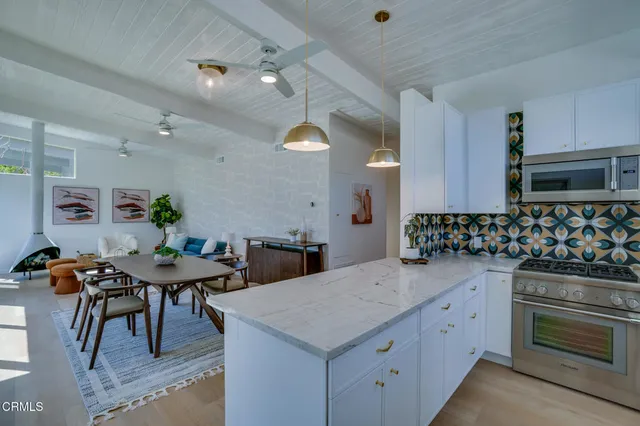 a view of a workspace with furniture