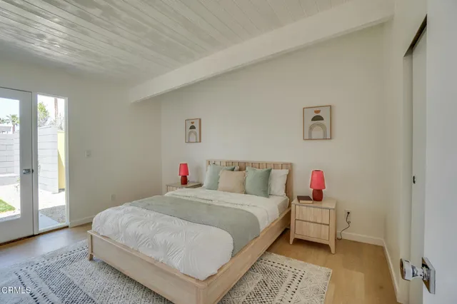 a bathroom with a sink vanity granite and shower