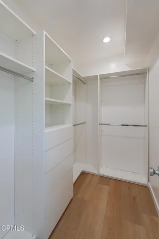 a swimming pool with outdoor seating and yard